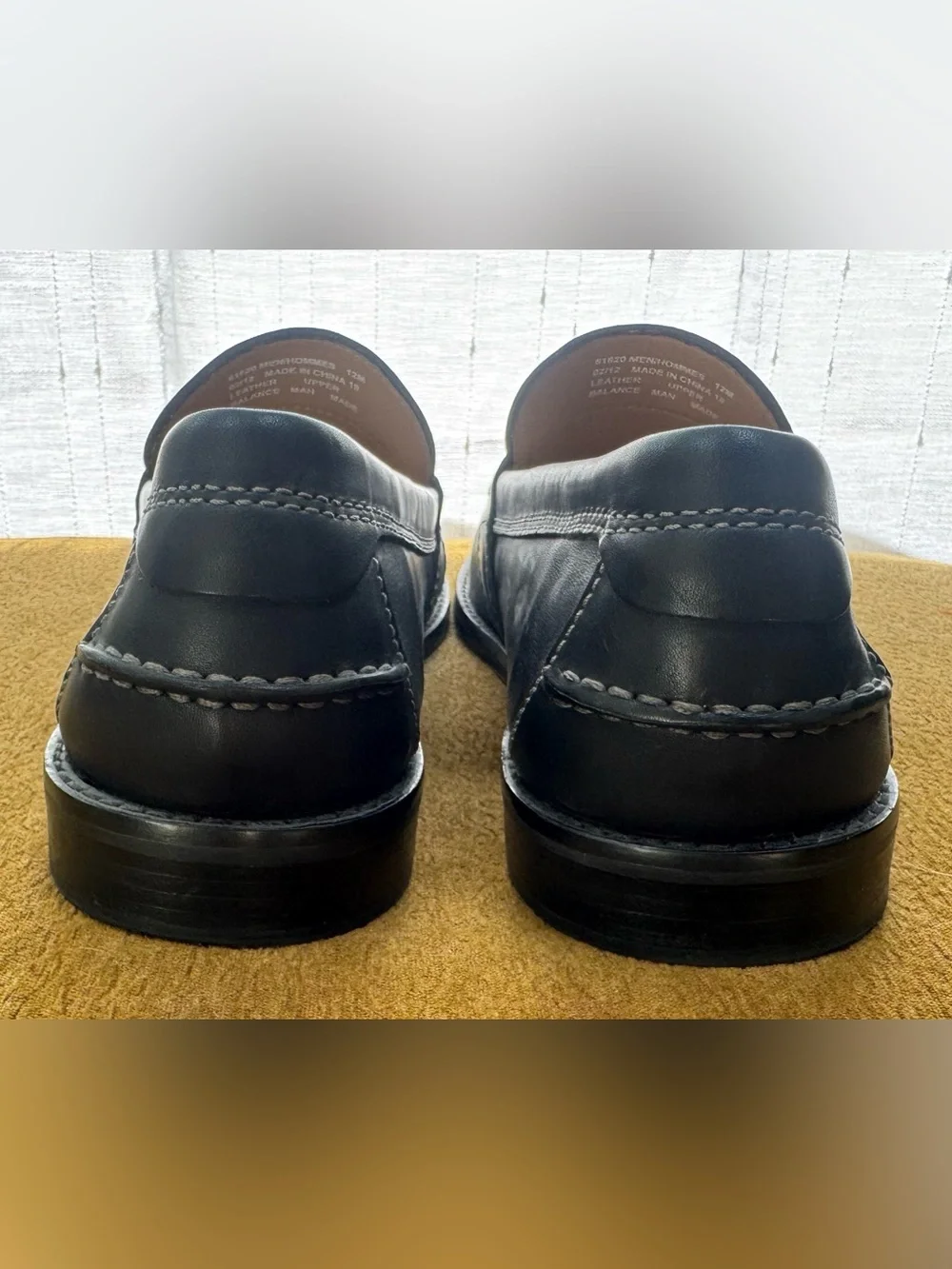 Clarks Black Leather Penny Loafers with Contrast Stitching